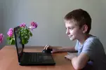 smiling-schoolboy-sitting-at-a-laptop_134398-7401.jpg smiling-schoolboy-sitting-at-a-laptop_134398-7401.jpg